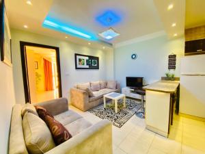 A seating area at Panda Grey with balcony Hurghada center
