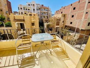 A balcony or terrace at Panda Grey with balcony Hurghada center