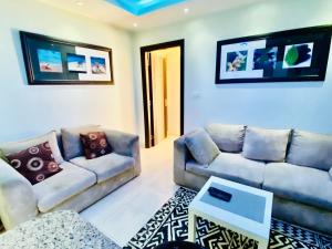 A seating area at Panda Grey with balcony Hurghada center