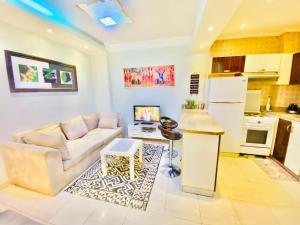 A kitchen or kitchenette at Panda Grey with balcony Hurghada center