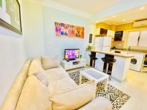 A kitchen or kitchenette at Panda Grey with balcony Hurghada center