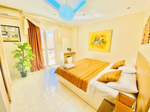 A bed or beds in a room at Panda Grey with balcony Hurghada center