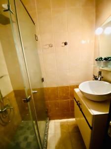 A bathroom at Panda Grey with balcony Hurghada center