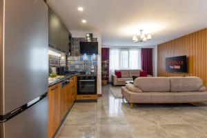 Kuchyň nebo kuchyňský kout v ubytování Baymari Suites Design Florya