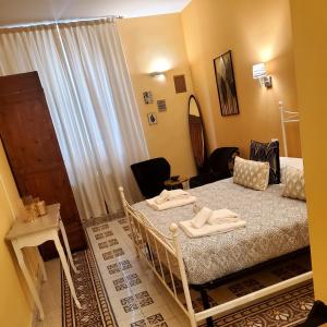 Postel nebo postele na pokoji v ubytování Residenza FillAnfi