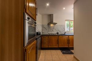 Kuchyňa alebo kuchynka v ubytovaní Appartement Cosy en Centre ville