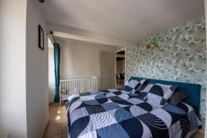 Posteľ alebo postele v izbe v ubytovaní Appartement Cosy en Centre ville