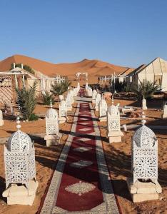 a cemetery in the middle of the desert at Luxury Desert Camp in Merzouga