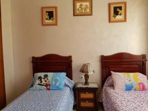 En eller flere senger på et rom på Residence Al Massira
