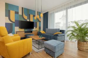 Część wypoczynkowa w obiekcie Sea&Sky View Apartment Par La Mer