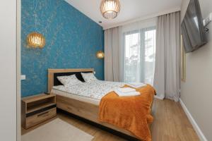 Łóżko lub łóżka w pokoju w obiekcie Sea&Sky View Apartment Par La Mer