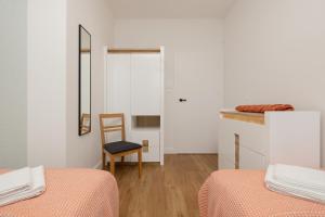 Łóżko lub łóżka w pokoju w obiekcie Sea&Sky View Apartment Par La Mer
