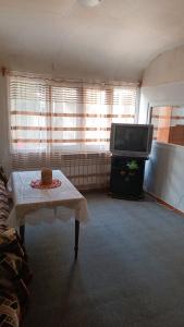 TV a/nebo společenská místnost v ubytování Arman Guest House