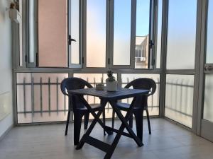 Balkón nebo terasa v ubytování Piazza Mazzini Apartment + 16 fotografií