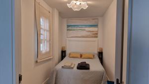 Postel nebo postele na pokoji v ubytování Aldea Blanca Cute