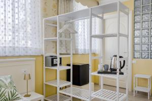 Kuchyň nebo kuchyňský kout v ubytování HOTEL Villa Lilla