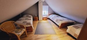 Postel nebo postele na pokoji v ubytování Haus Küstenheide