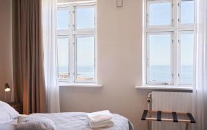 Postel nebo postele na pokoji v ubytování Hotel Klippen