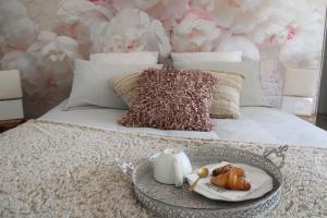 Postel nebo postele na pokoji v ubytování Chambre d'hôtes Les Magnolias