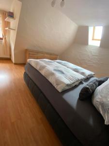 a bedroom with two beds in a attic at Ferienhaus Heidi in Bundenthal