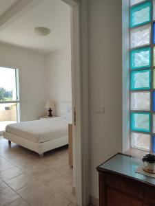 Кровать или кровати в номере Panoramico, in villa, grande, con ampie terrazze