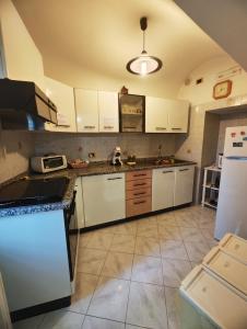 A kitchen or kitchenette at Casa Eden