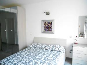 Postel nebo postele na pokoji v ubytování Direttamente Al Lago Apartments
