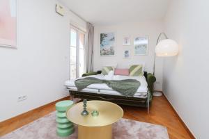 Posteľ alebo postele v izbe v ubytovaní IMMOGROOM - Beautiful and Cosy - Air conditioner - 5 min from beaches + 17 fotografií