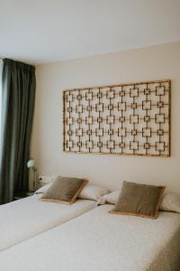 A bed or beds in a room at Mares - Bellamar