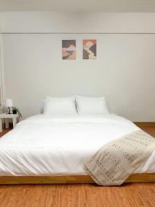 Postel nebo postele na pokoji v ubytování MONTANA Hotel & Hostel Phuket