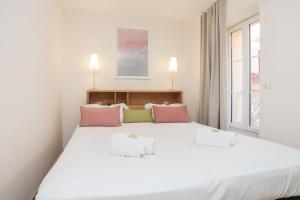 Posteľ alebo postele v izbe v ubytovaní IMMOGROOM - Beautiful and cosy- Suquet- near the beaches - AC