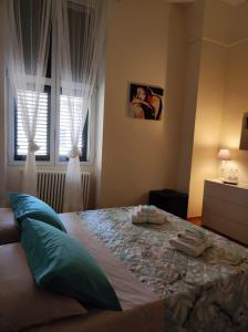 Un ou plusieurs lits dans un hébergement de l'établissement Miro B&B
