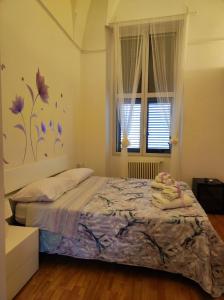 Un ou plusieurs lits dans un hébergement de l'établissement Miro B&B