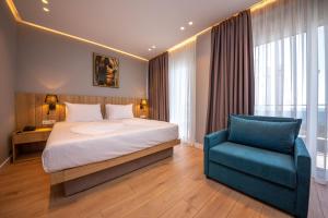 Letto o letti in una camera di Azure Inn Hotel