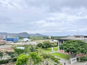 an aerial view of a city with mountains in the background at 永安101 Wing on x 附陽台 in Taitung City