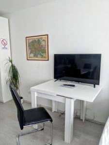 Telewizja i/lub zestaw kina domowego w obiekcie 204 Paris 59m2 4-8 Pers extr Bedroom