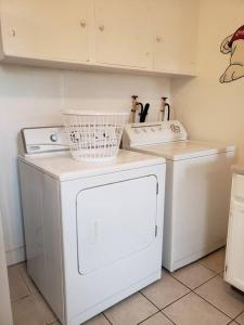 a laundry room with a washer and dryer at Cozy 2 bedroom 1 bath unit in Anderson