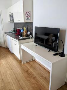Kuchnia lub aneks kuchenny w obiekcie 215 Apartment Wien 4-6 Pers 42m2