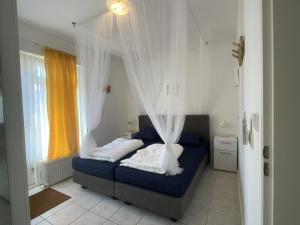 Ένα ή περισσότερα κρεβάτια σε δωμάτιο στο Sleedoornstraat 1