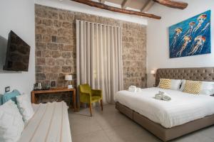Posteľ alebo postele v izbe v ubytovaní La Chiaja art&relais + 37 fotografií