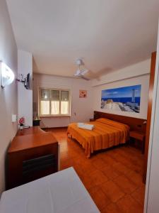 A bed or beds in a room at Residence Stella Maris