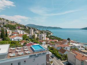 a view of a city and the water at Garni Hotel Kruso in Herceg-Novi