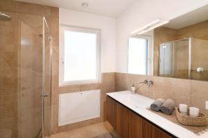 A bathroom at Apartments Johanna Még 37 kép
