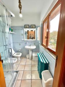 Ένα μπάνιο στο Casa vacanze Stintino vista mare