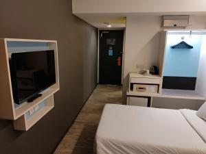 Et tv og/eller underholdning på Comfy Room In Genting Highlands