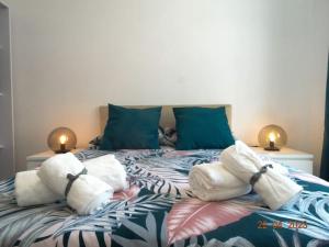 Cama ou camas em um quarto em Villa Andorinha