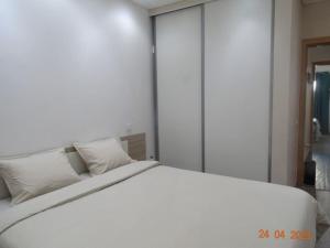 Cama ou camas em um quarto em Villa Andorinha