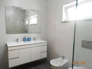 Um banheiro em Villa Andorinha