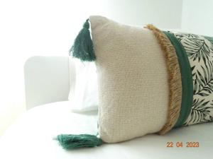 Cama ou camas em um quarto em Villa Andorinha