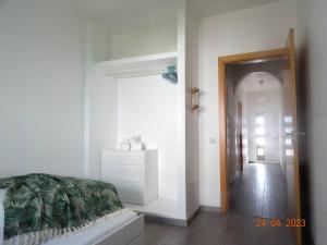 Cama ou camas em um quarto em Villa Andorinha